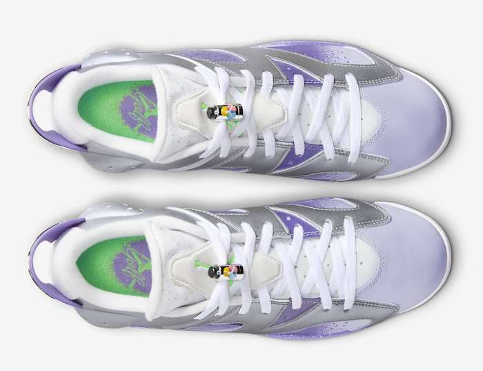 Overview of purple and grey Air Jordan golf shoes.